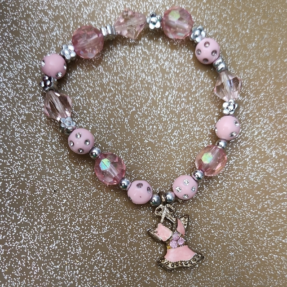 Pink Beaded Bracelet with Dress Charm